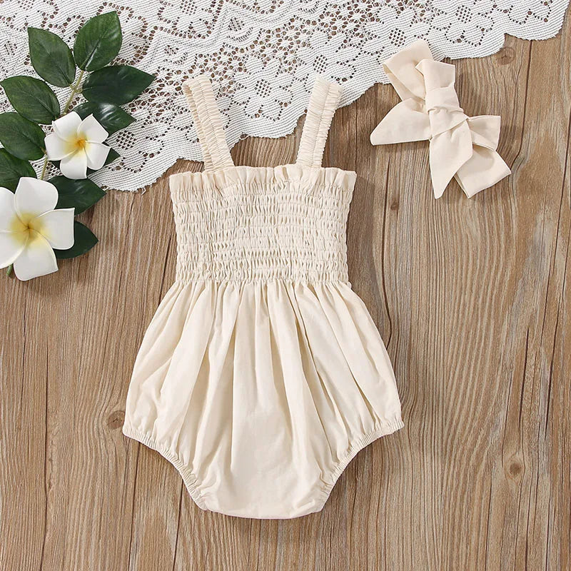 Smocked Baby Romper with Bow
