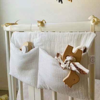 Organisateur de lit de bébé